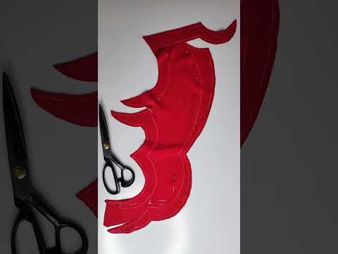 Upcyklingowa marynarka z symbolem banku Pekao. Zubr w firmowych kolorach